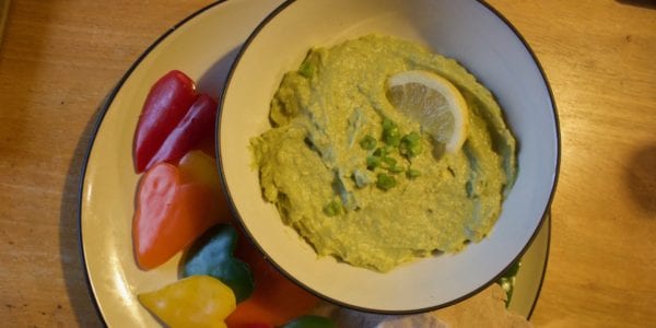 avocado dip with veggies and pita