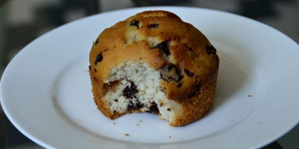 a blueberry muffin on a table