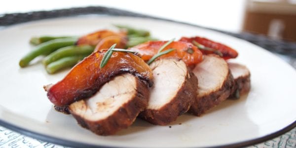 pork with peaches on plate