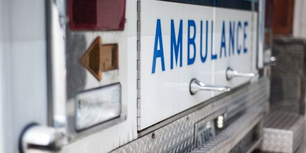 Ambulance at the entrance of an emergency room.