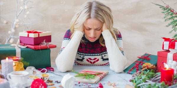 Woman in stress about Christmas holidays