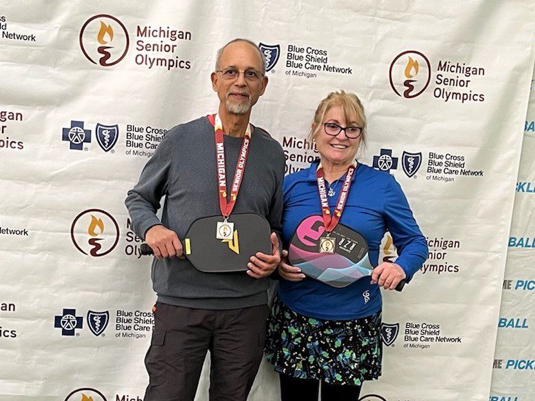 Lorna Rose, right, poses for a photo with her pickleball partner at the March 2023 Michigan Senior Olympics. 
