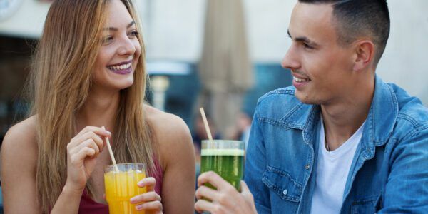 Young couple drinking non-alcoholic drinks